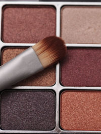 Close-up of beauty product with make-up brush