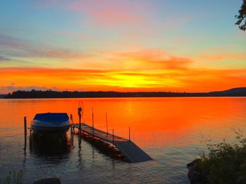 Scenic view of sunset over lake