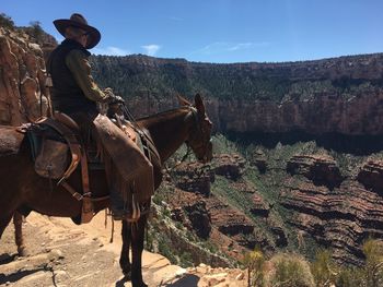 Man with horse rock