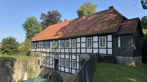 House on field against sky