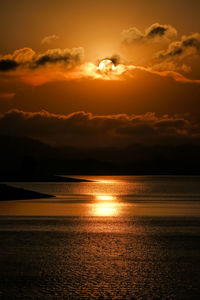 Scenic view of sea against sky during sunset