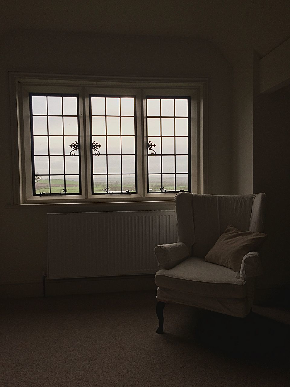 window, indoors, glass - material, architecture, transparent, built structure, home interior, empty, absence, house, room, interior, curtain, domestic room, open, chair, day, no people, door, flooring