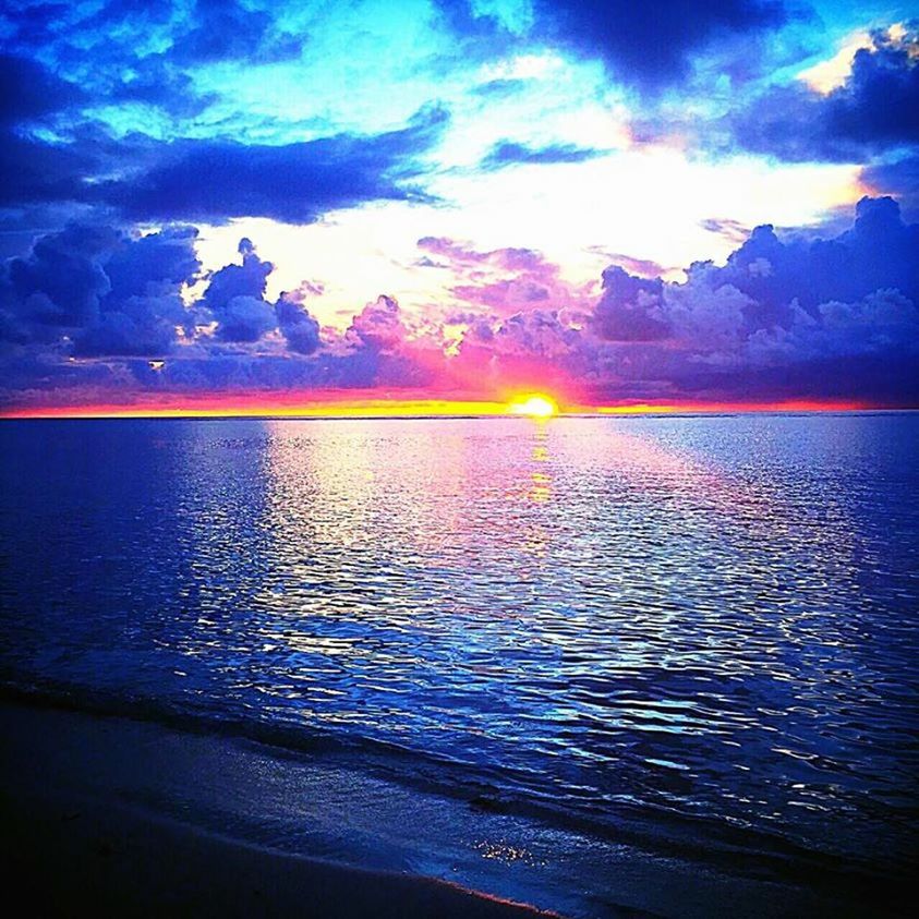 water, sky, scenics, sea, tranquil scene, sunset, beauty in nature, tranquility, cloud - sky, horizon over water, idyllic, nature, cloud, reflection, cloudy, dramatic sky, beach, silhouette, waterfront, blue