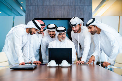 Man using laptop at office