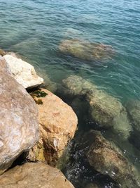 High angle view of rock formation in sea