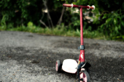 Close-up of bicycle on road