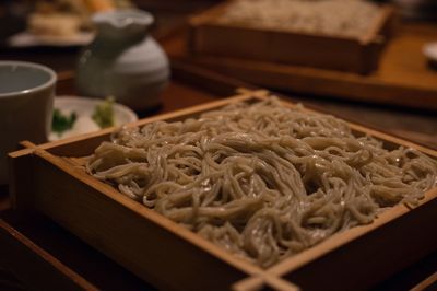 High angle view of noodles in container on table