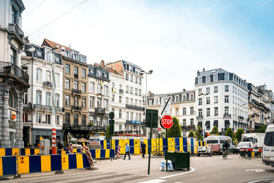 Houses in city against sky