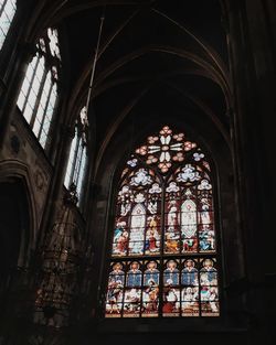 Low angle view of glass window in building