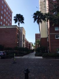 Street in city against clear sky