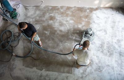 High angle view of man skateboarding on floor