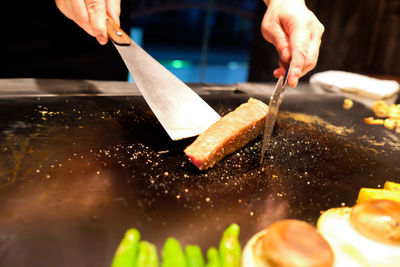 Close-up of hand holding food