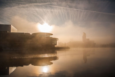 Panoramic view of factory against sky