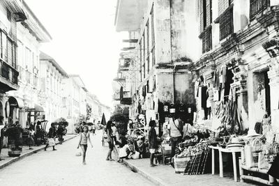 People on street in city