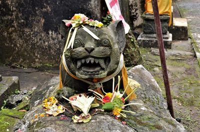 Sculpture of buddha statue outside temple