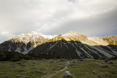 Scenic view of snowcapped mountains against sky