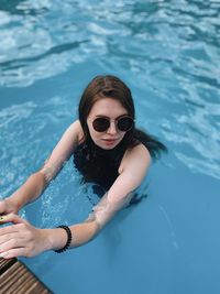 Woman swimming in pool