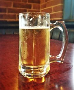 Close-up of beer in glass on table