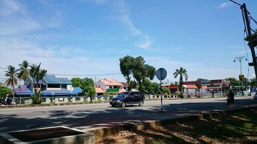 Road with buildings in background