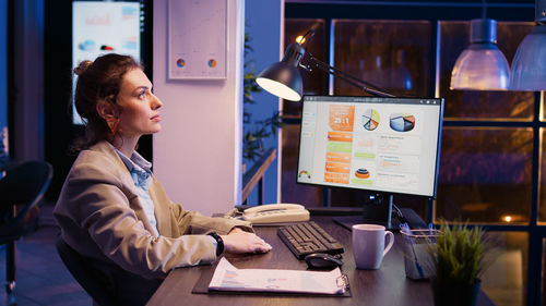 Business colleagues working at desk in office