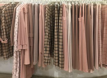 Close-up of clothes hanging at store