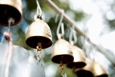 Low angle view of bell hanging in temple