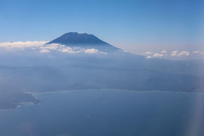 Scenic view of sea against cloudy sky