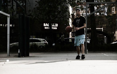 Woman standing in city