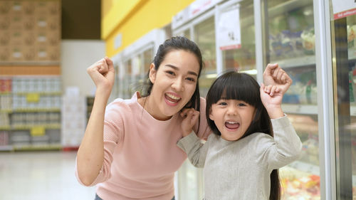 Portrait of smiling girl in store