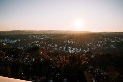 High angle view of cityscape against sky during sunset