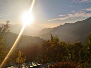 Scenic view of mountains against sky during sunset