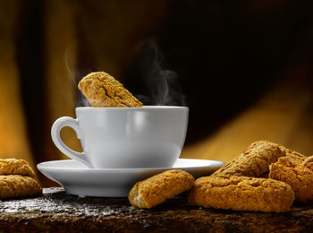 Close-up of coffee cup on table