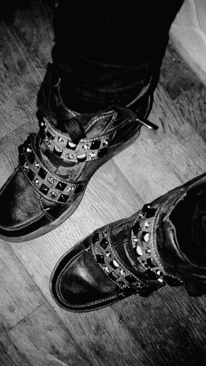 high angle view, indoors, shoe, close-up, old, metal, transportation, sunlight, wood - material, no people, day, street, steps, part of, still life, shadow, low section, old-fashioned, absence