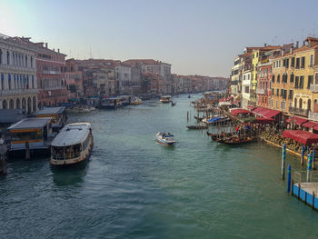 Boats moored in canal