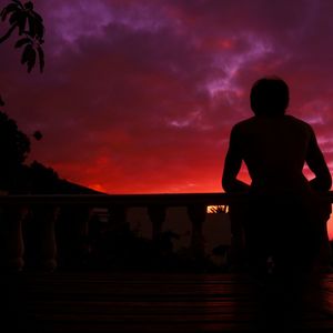 Silhouette of people at sunset