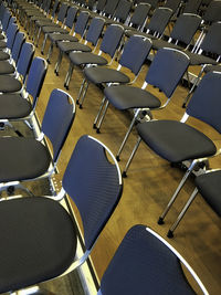 Empty chairs in a row