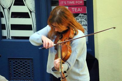 Young woman playing outdoors