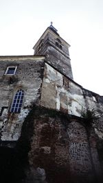 Low angle view of historic building against clear sky