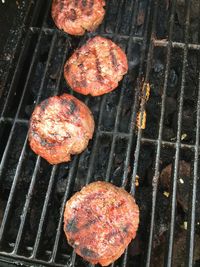 Close-up of meat on barbecue grill