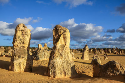 Panoramic view of rock formations against sky