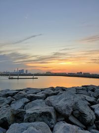 Scenic view of sea against sky during sunset