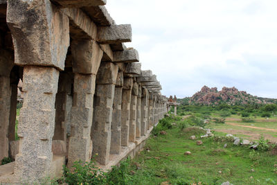 View of old ruin building on field