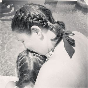 Close-up of young woman in water