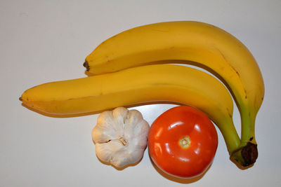 High angle view of fruits against white background