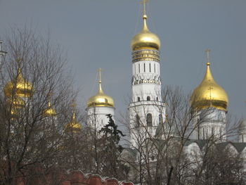 View of church and building against sky