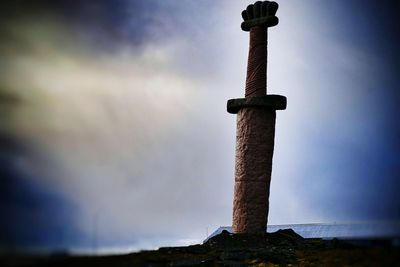 Low angle view of lighthouse against sky