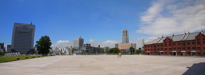 View of city against cloudy sky