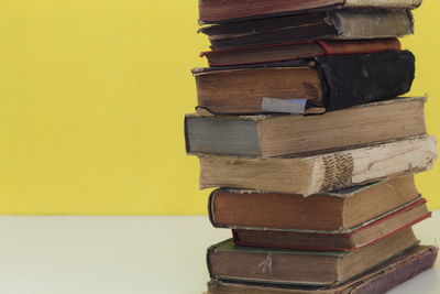 Close-up of stack of books on table