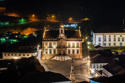 High angle view of buildings at night