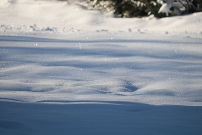 Scenic view of snowcapped landscape against sky